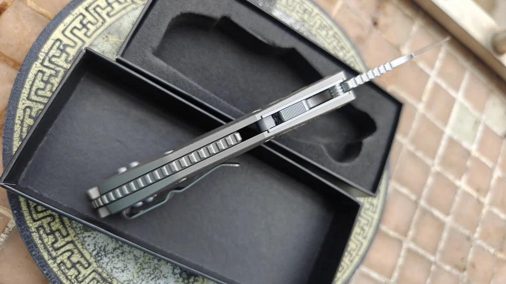 JUFULE Stitch RamL Manual Titanium Handle Ceramics Bearing Mark M390MK Blade Hunting Outdoor Fish EDC Tool Folding Camping Knife