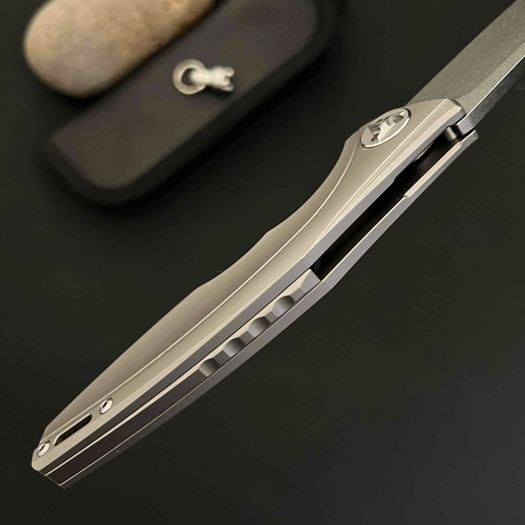 M390 powder steel folding knife TC4 titanium alloy handle high hardness sharp self-defense knife water field survival knife